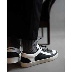 OSWEN Eleganter Sneaker aus Leder in schwarz weiß mit Naturkautschuklaufsohle